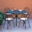 Pigalle stackable armchair of Emu in antique iron color with cushion